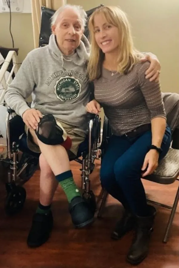 Laura Carson with her father during his care at home